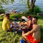 Fika break next to the waters, while on a guided kayak tour in Stockholm